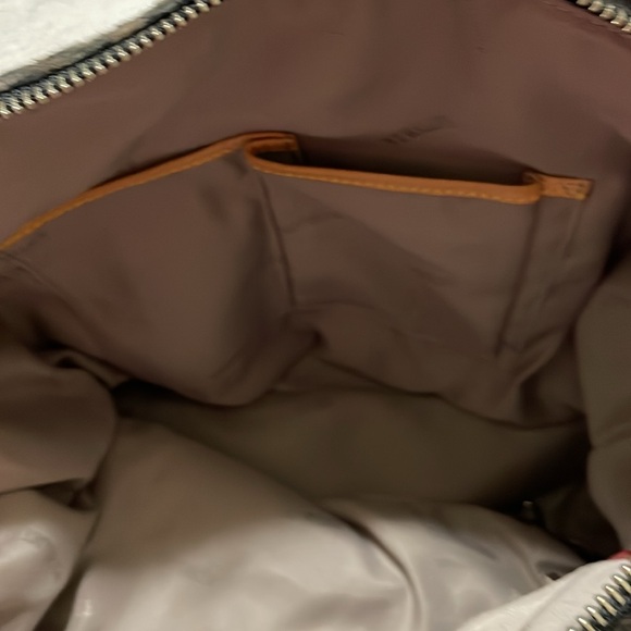 Leopard print with the feel of fur.MZ Wallace purse.Red trim with black handles. - Picture 4 of 7